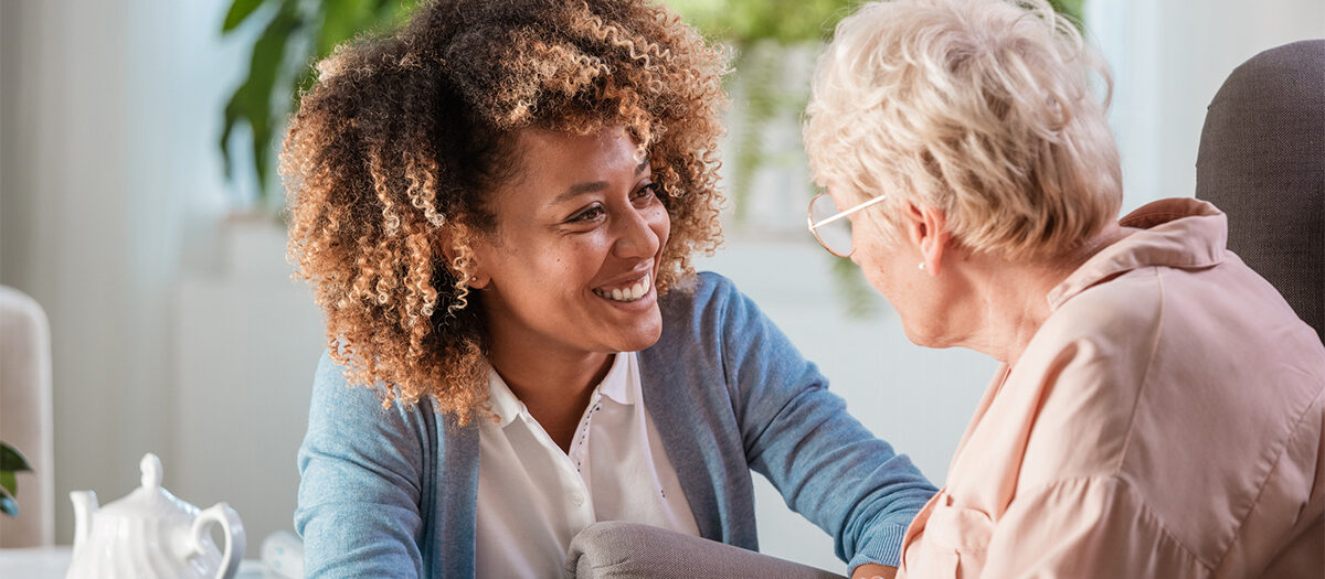 Caregiver with a memory care resident