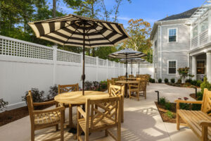 Patio tables and chairs in the outdoor courtyard
