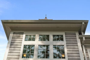 Exterior view of second floor windows at Duxbury House Memory Care Residence