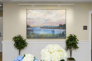 Framed painting of an inlet