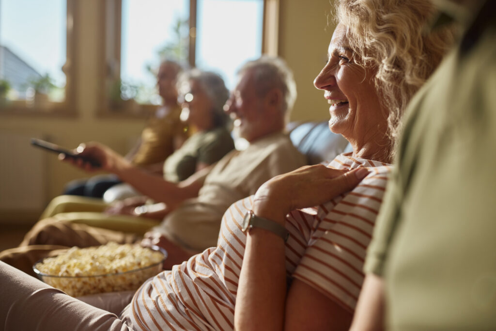 Group of senior friends watching a movie