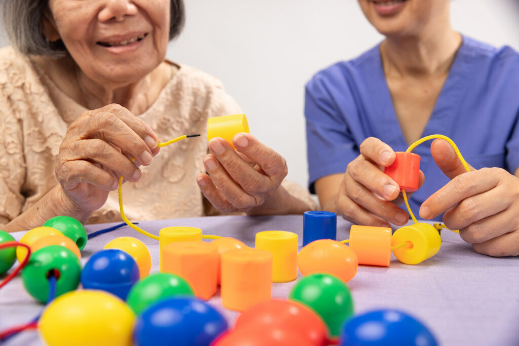 senior working on memory game