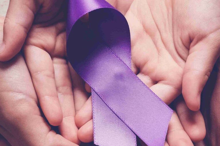 Alzheimers Awareness Ribbon in Hands